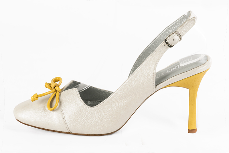 Off white women's open back shoes, with a knot. Round toe. Very high slim heel. Profile view - Florence KOOIJMAN